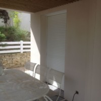 Habillage en lattis de bois de plafonds extérieurs