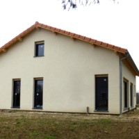 Maison enduite en ossature Bois made with BATICOO HABITAT